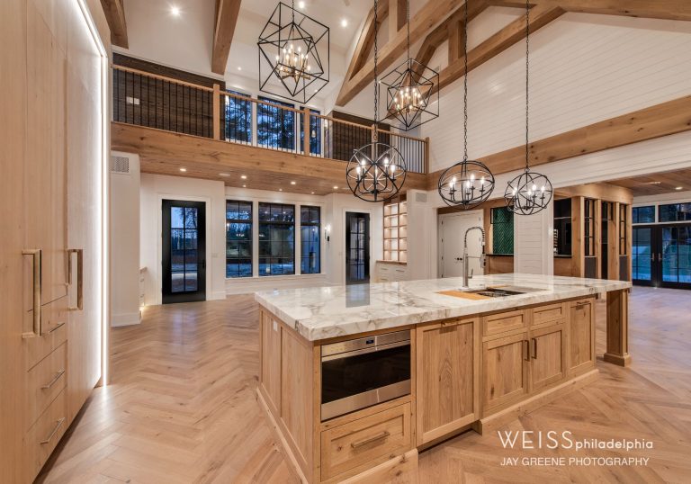 best custom homes wayne pa - design home studios - kitchen - light cabinets white countertops - exposed beams - farmhouse