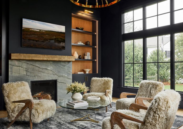 new homes Philadelphia pa - design home studios - lounge room - dark walls - fur chairs - granite fireplace