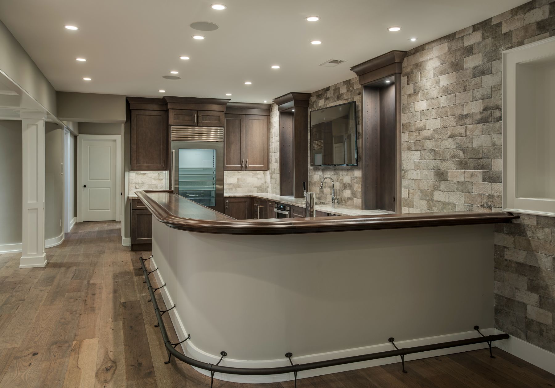 design home studios - best custom home builder Philadelphia pa - bar - wine fridge - stone walls - dark wood